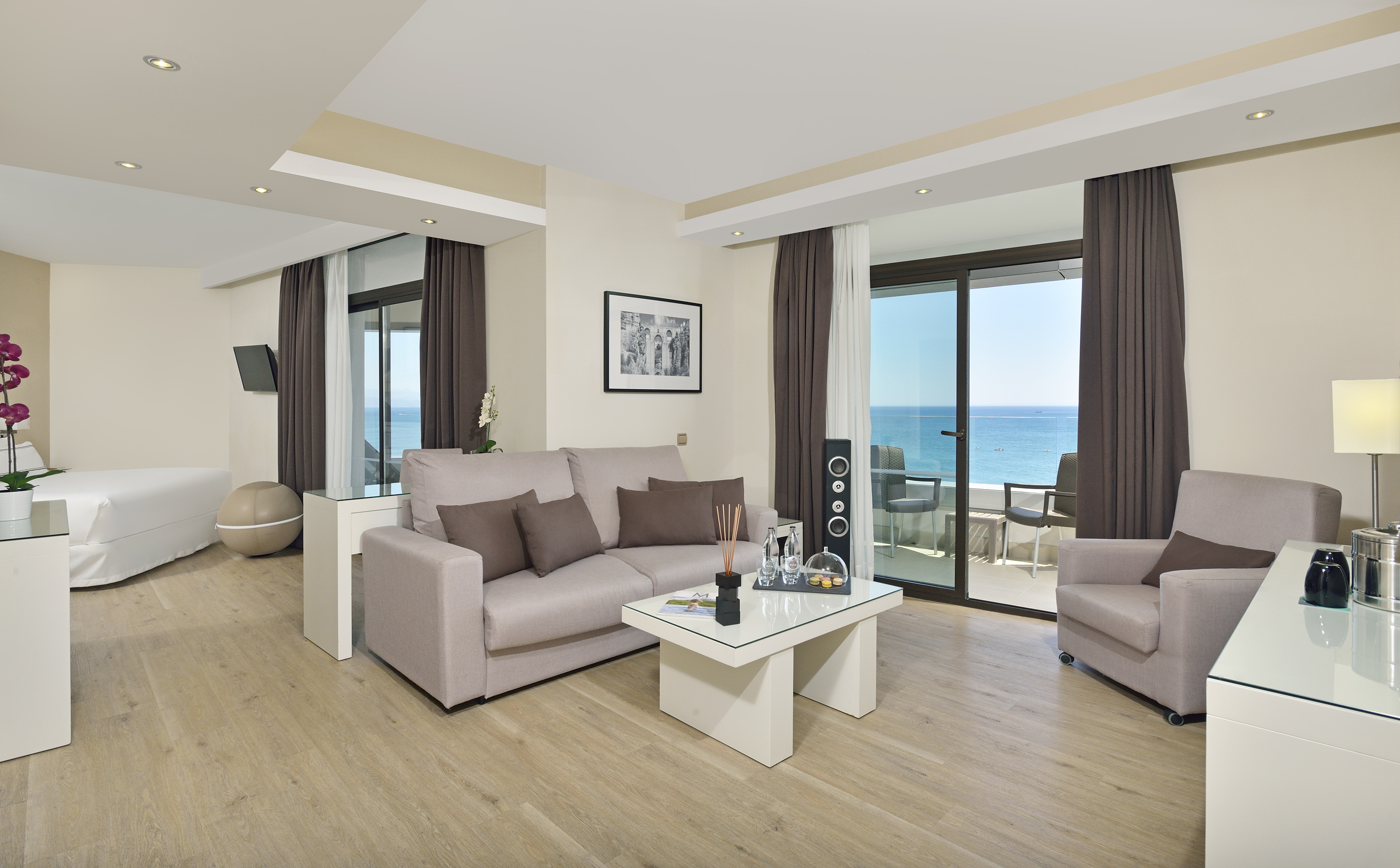 a living room with a couch and a table