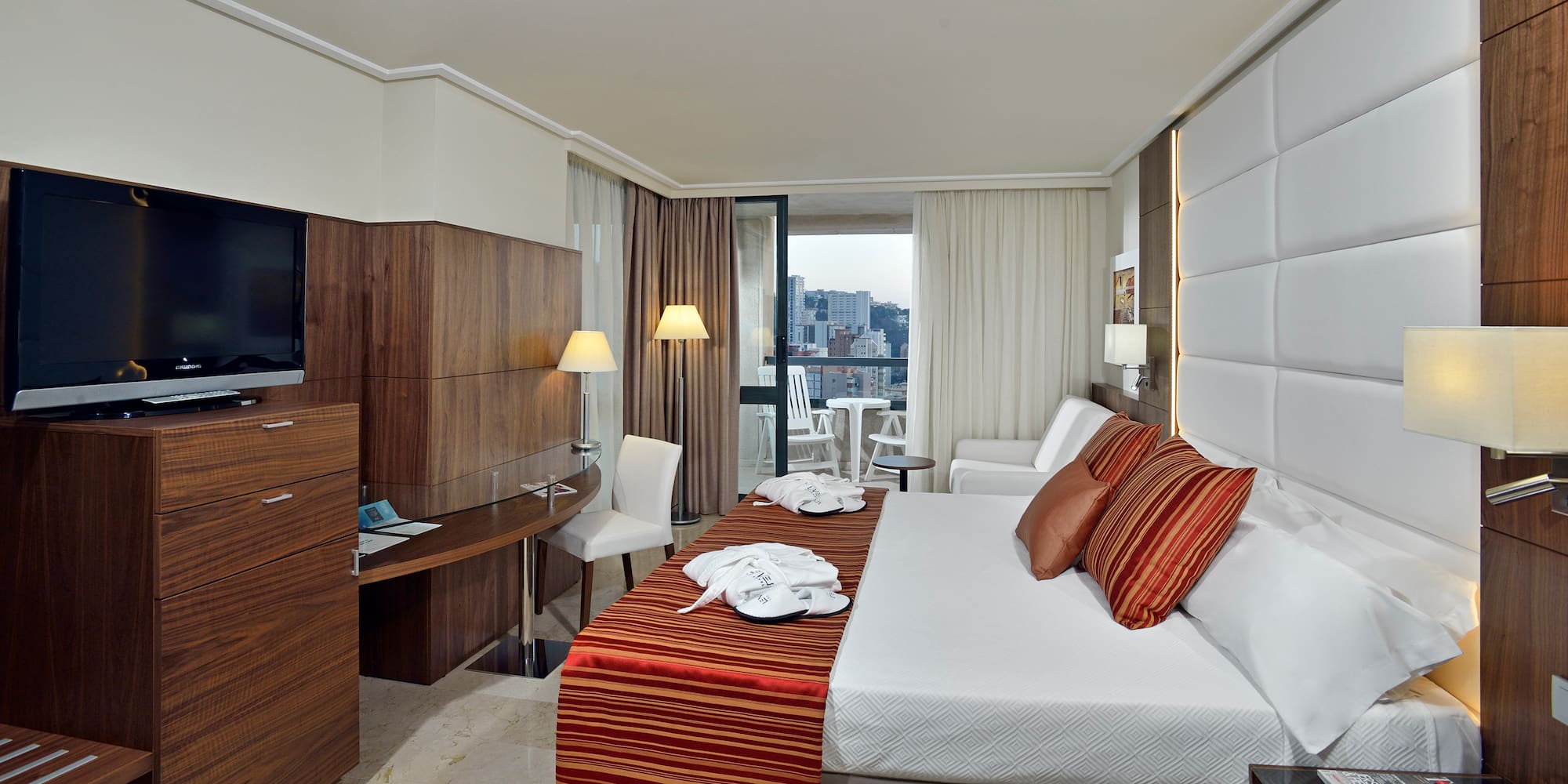 a room with a bed and a table