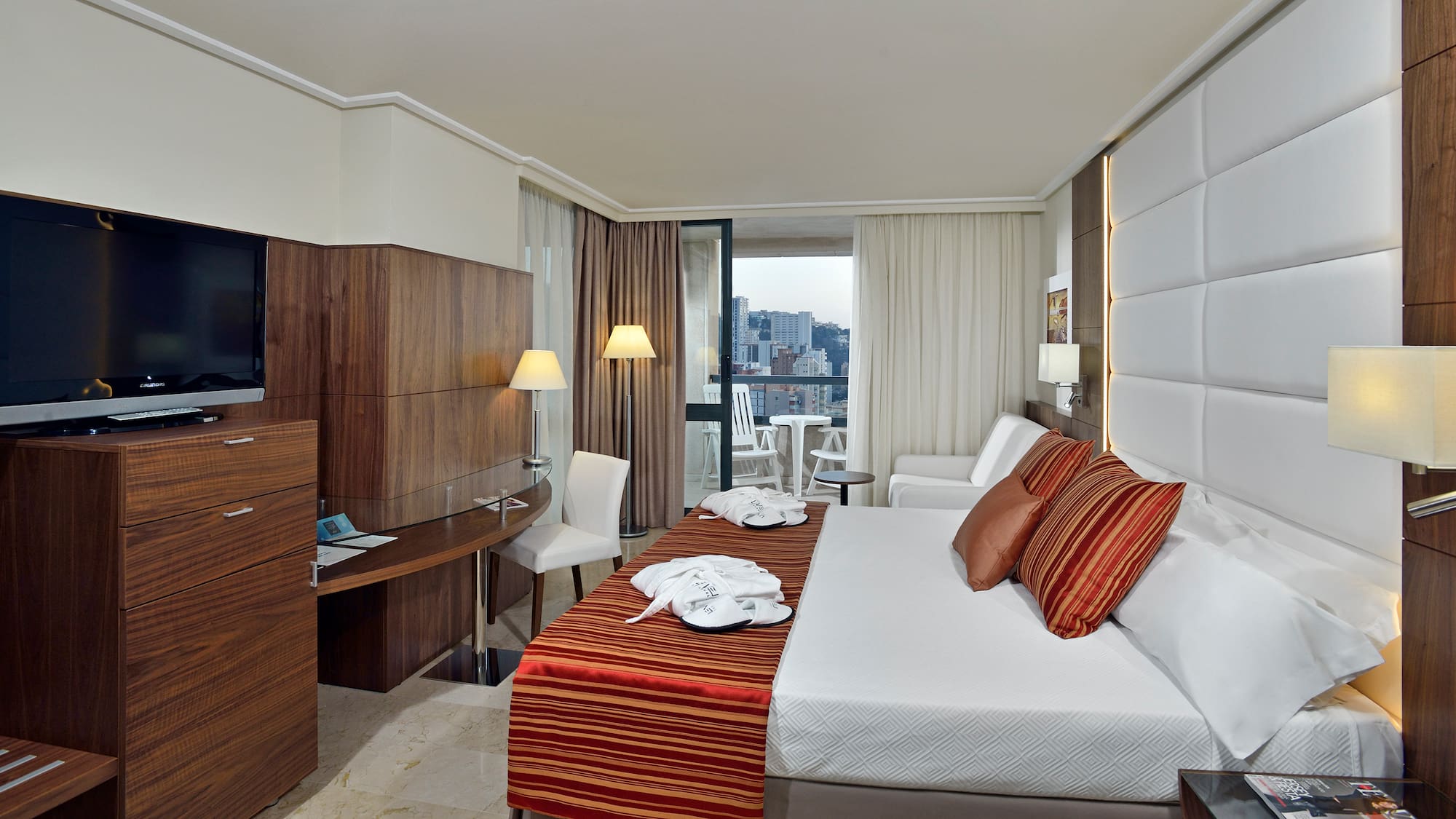 a room with a bed and a table