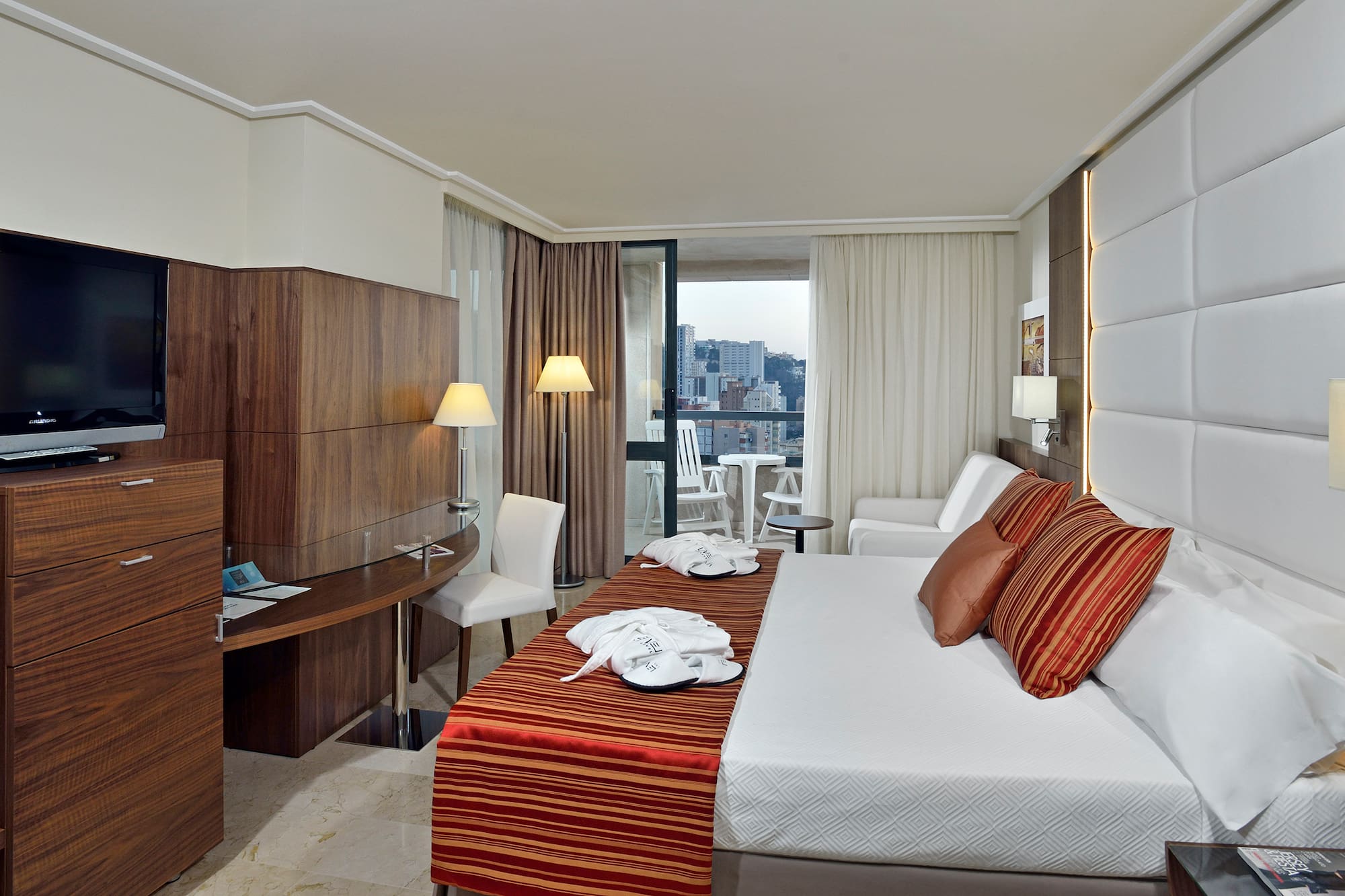 a room with a bed and a table