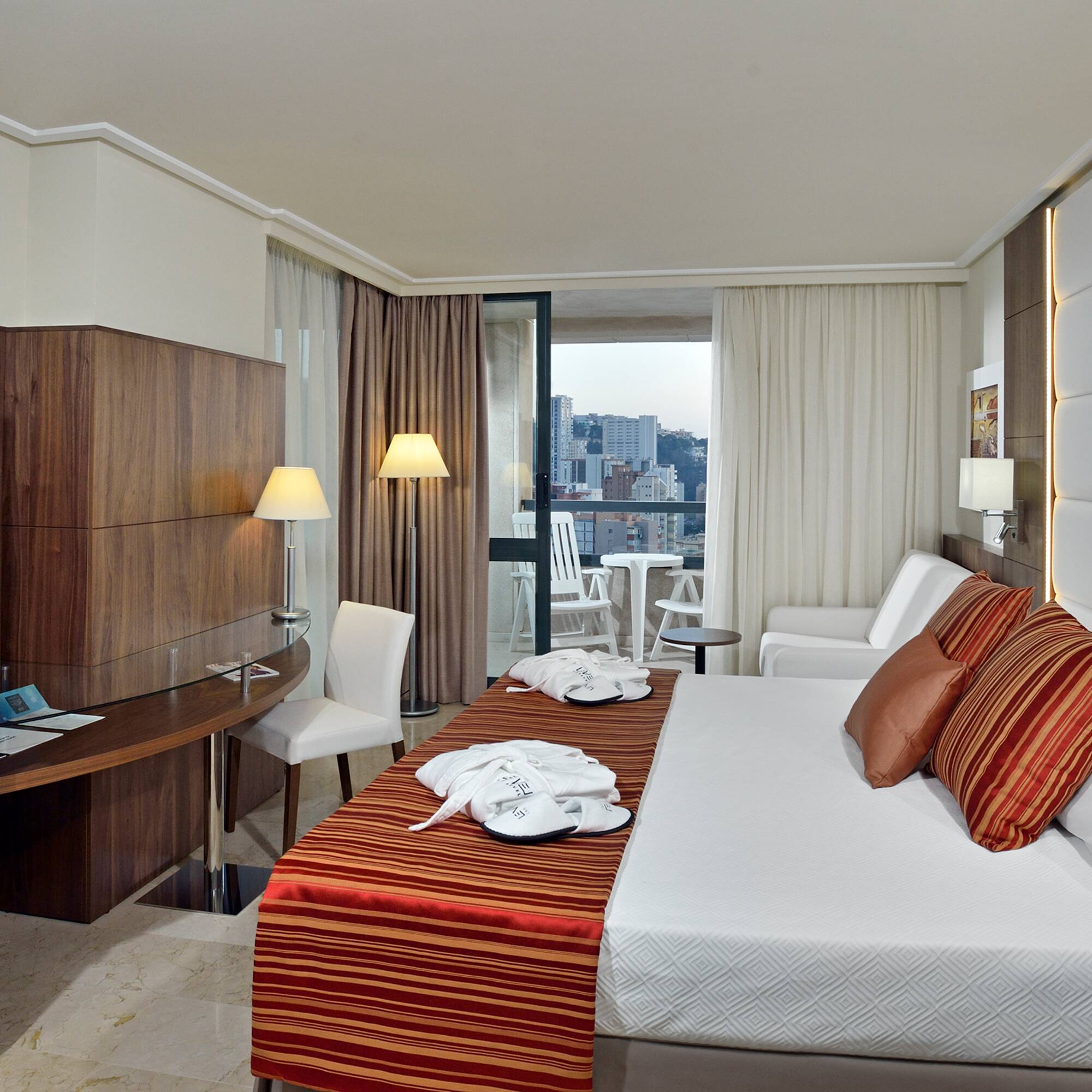 a room with a bed and a table