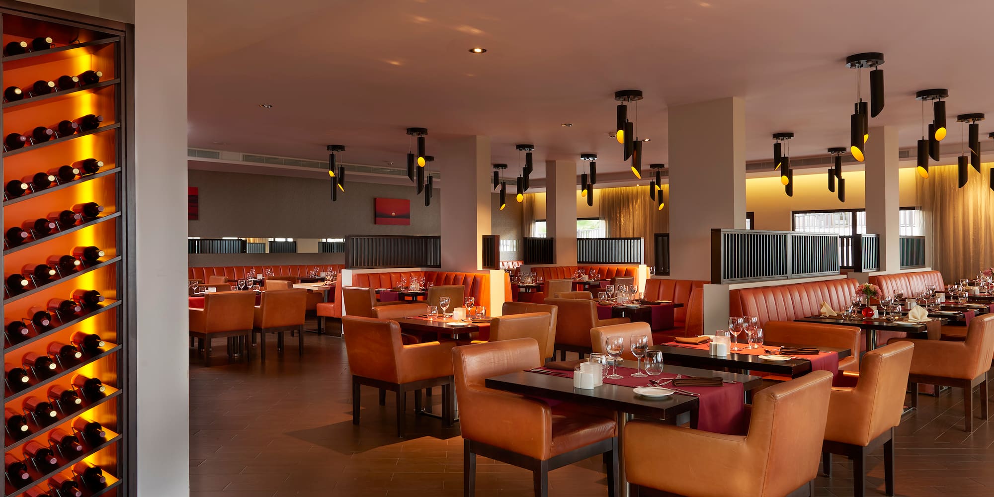 a restaurant with tables and chairs