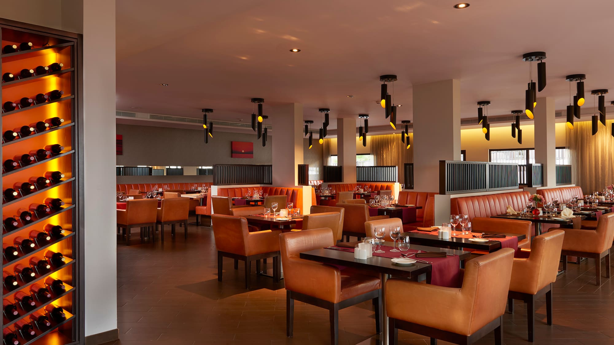 a restaurant with tables and chairs