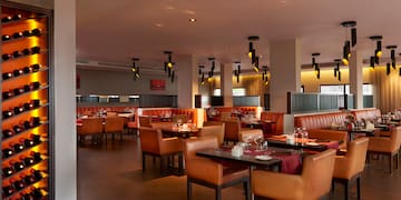 a restaurant with tables and chairs