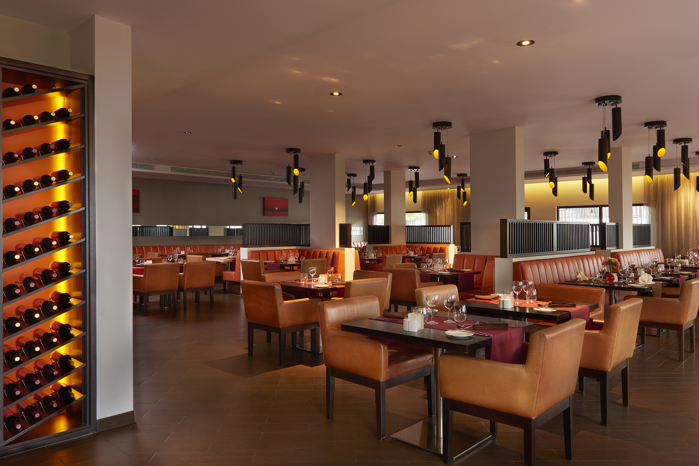 a restaurant with tables and chairs