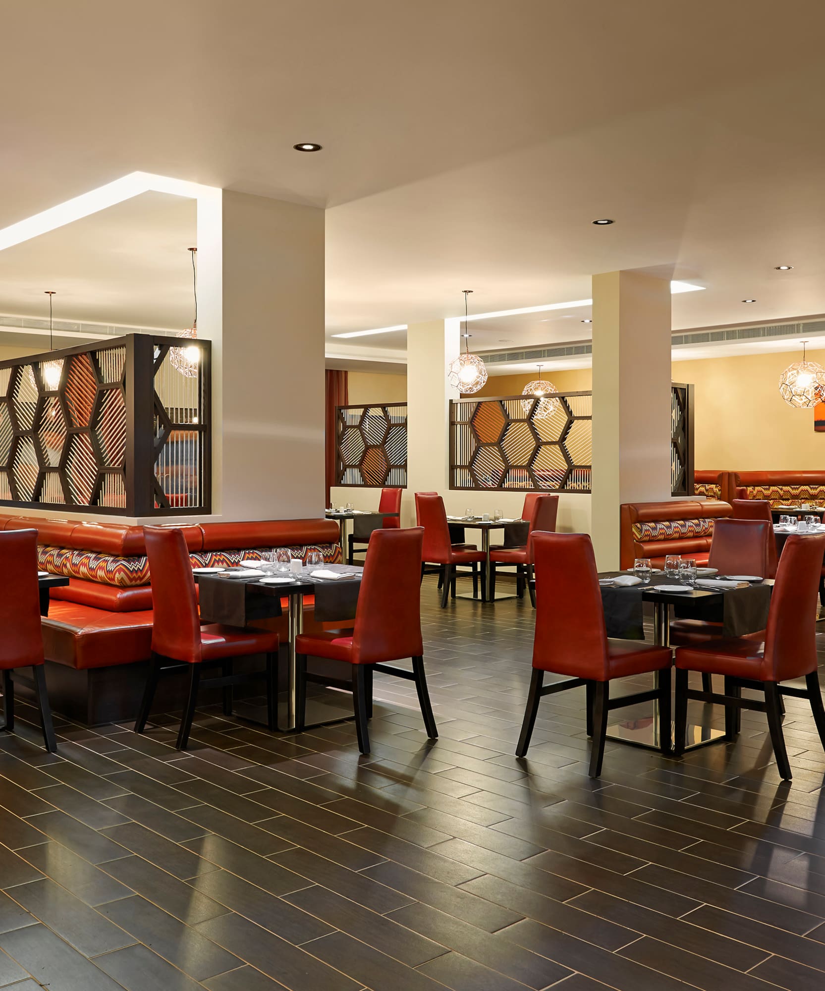 a restaurant with tables and chairs