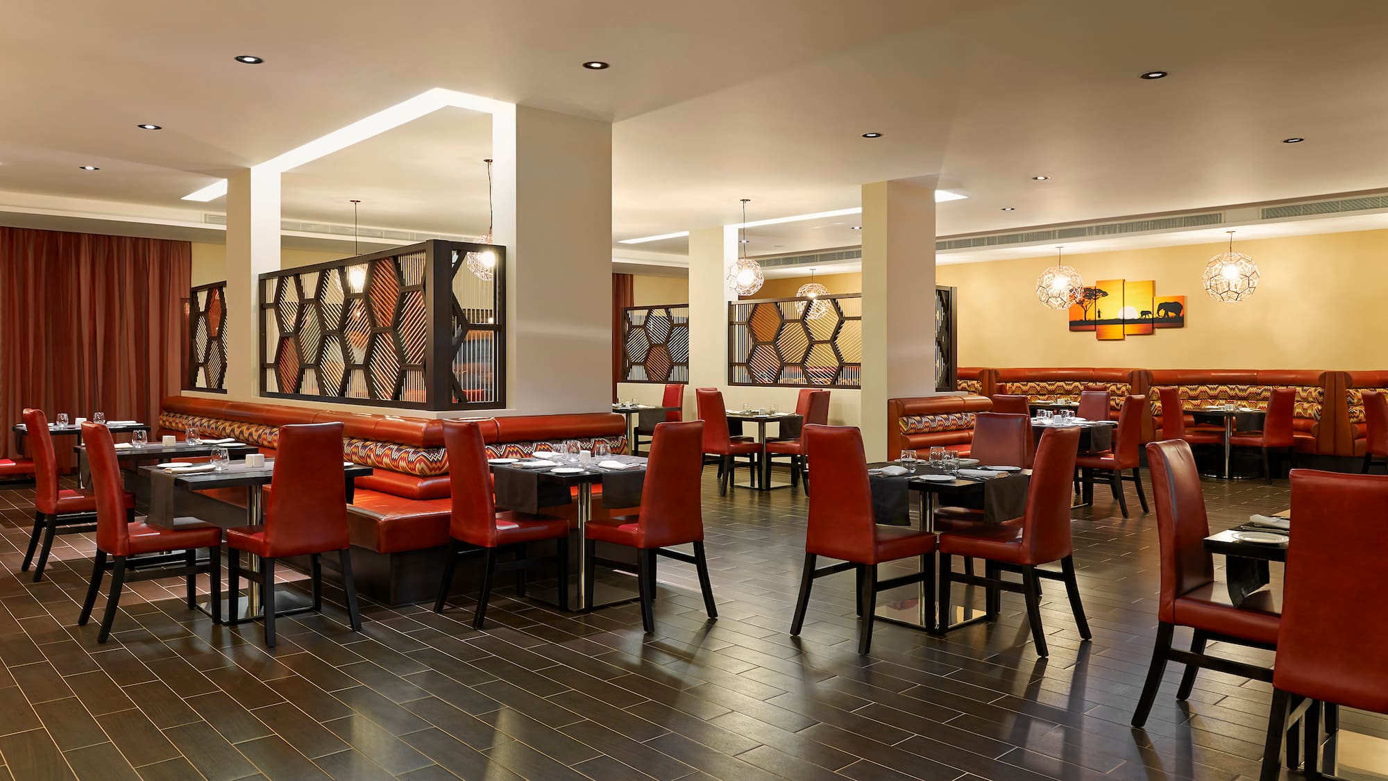 a restaurant with tables and chairs