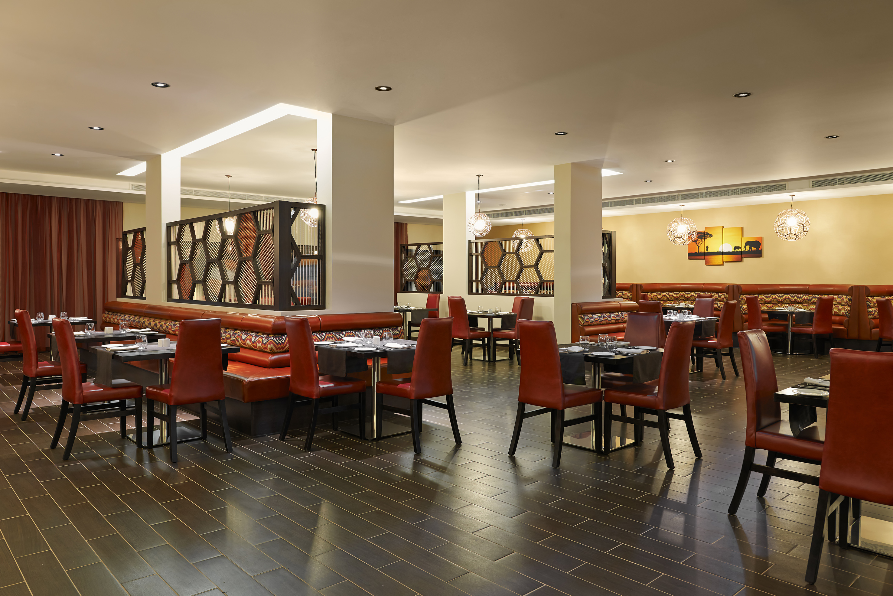 a restaurant with tables and chairs
