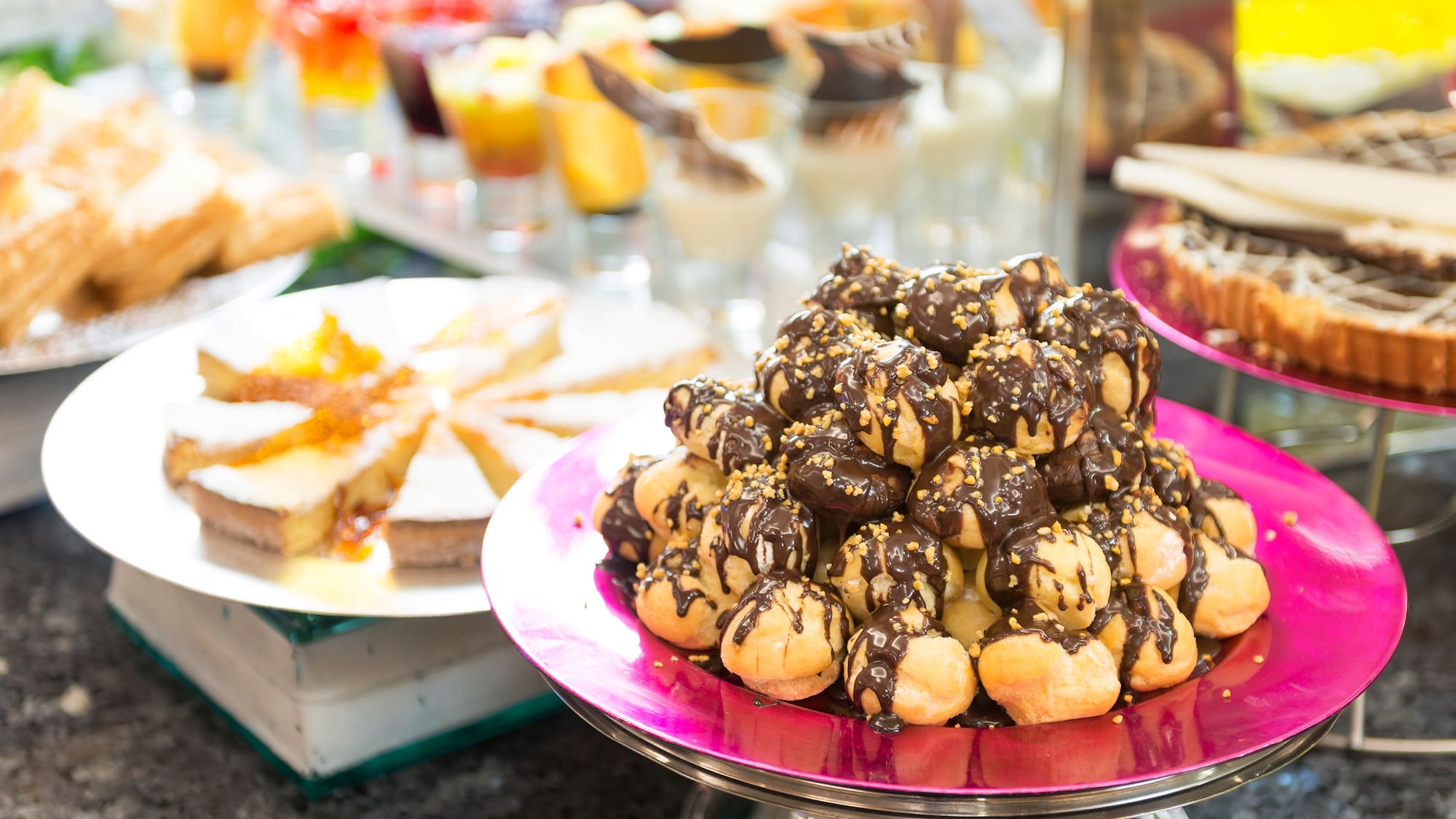 a plate of desserts on a table