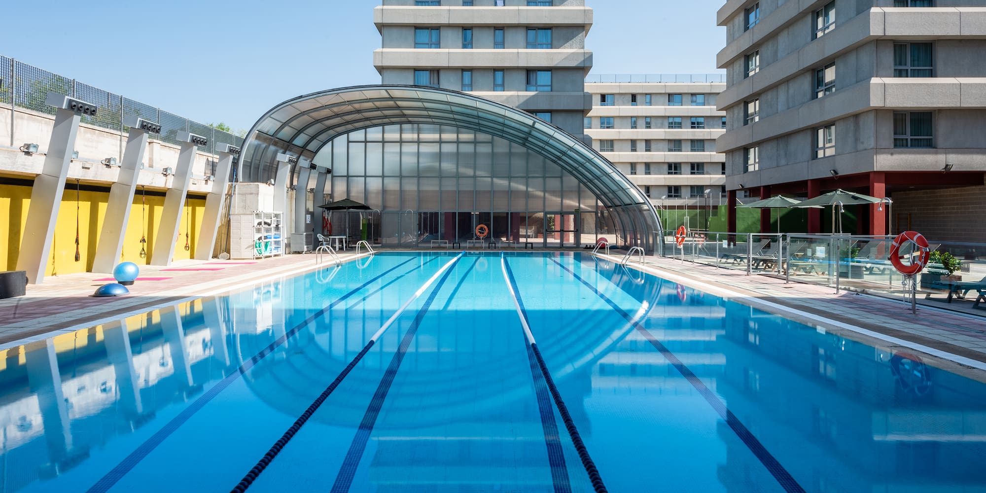 a swimming pool with a roof over it