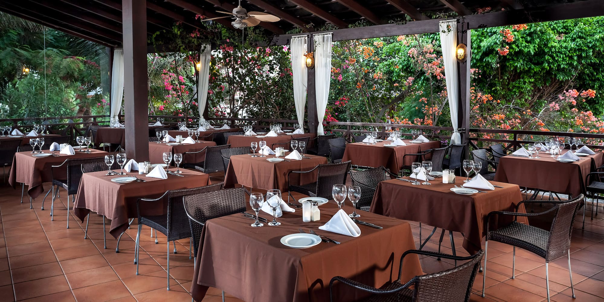 a restaurant with tables and chairs