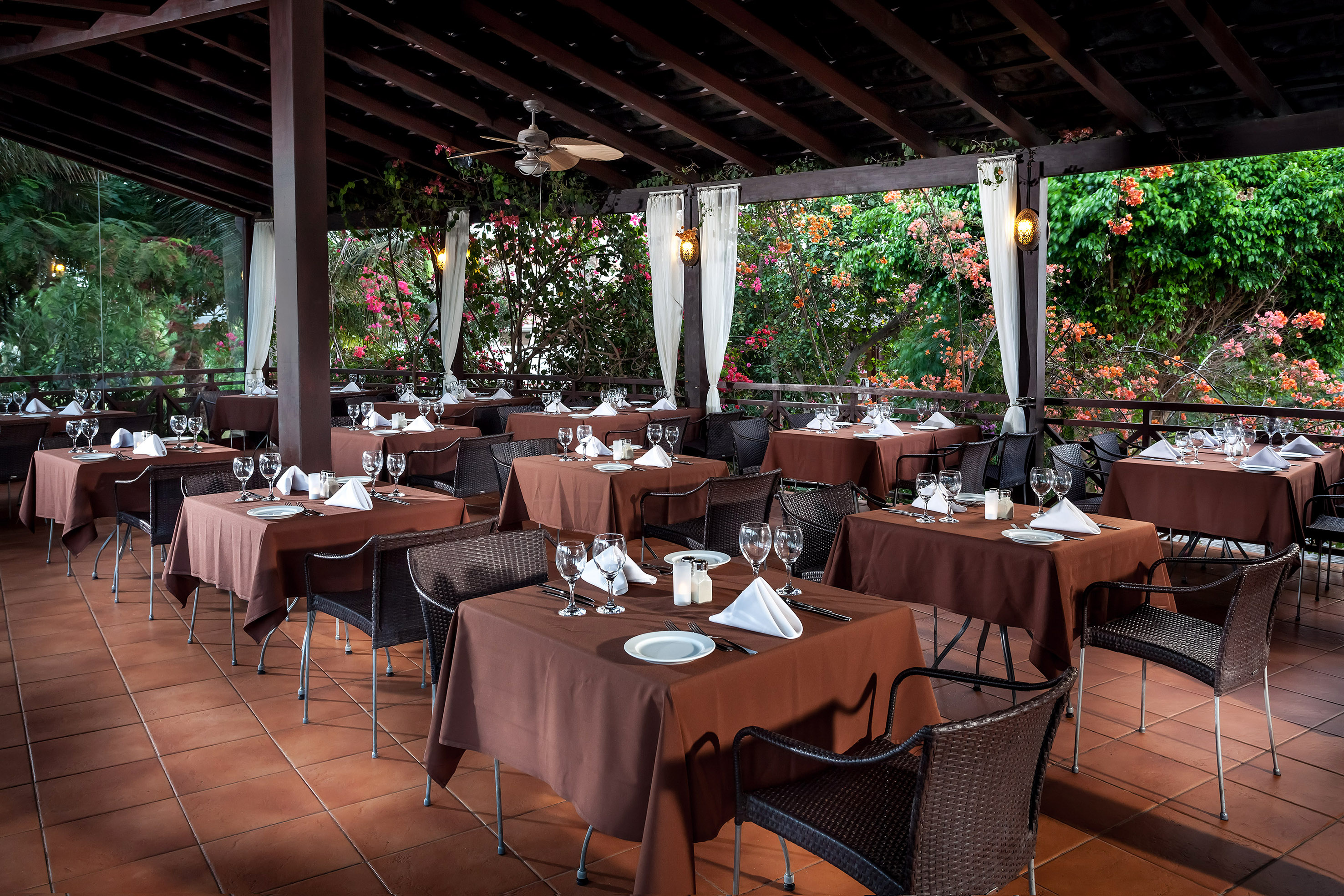 a restaurant with tables and chairs