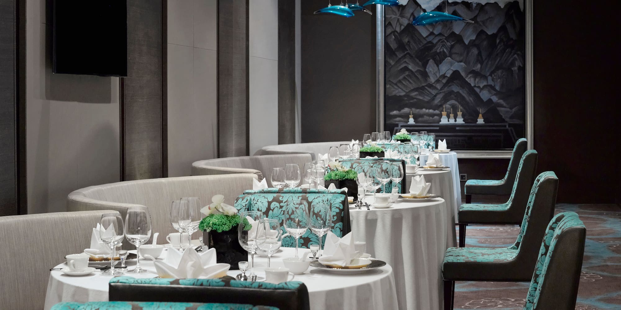 a restaurant with tables and chairs