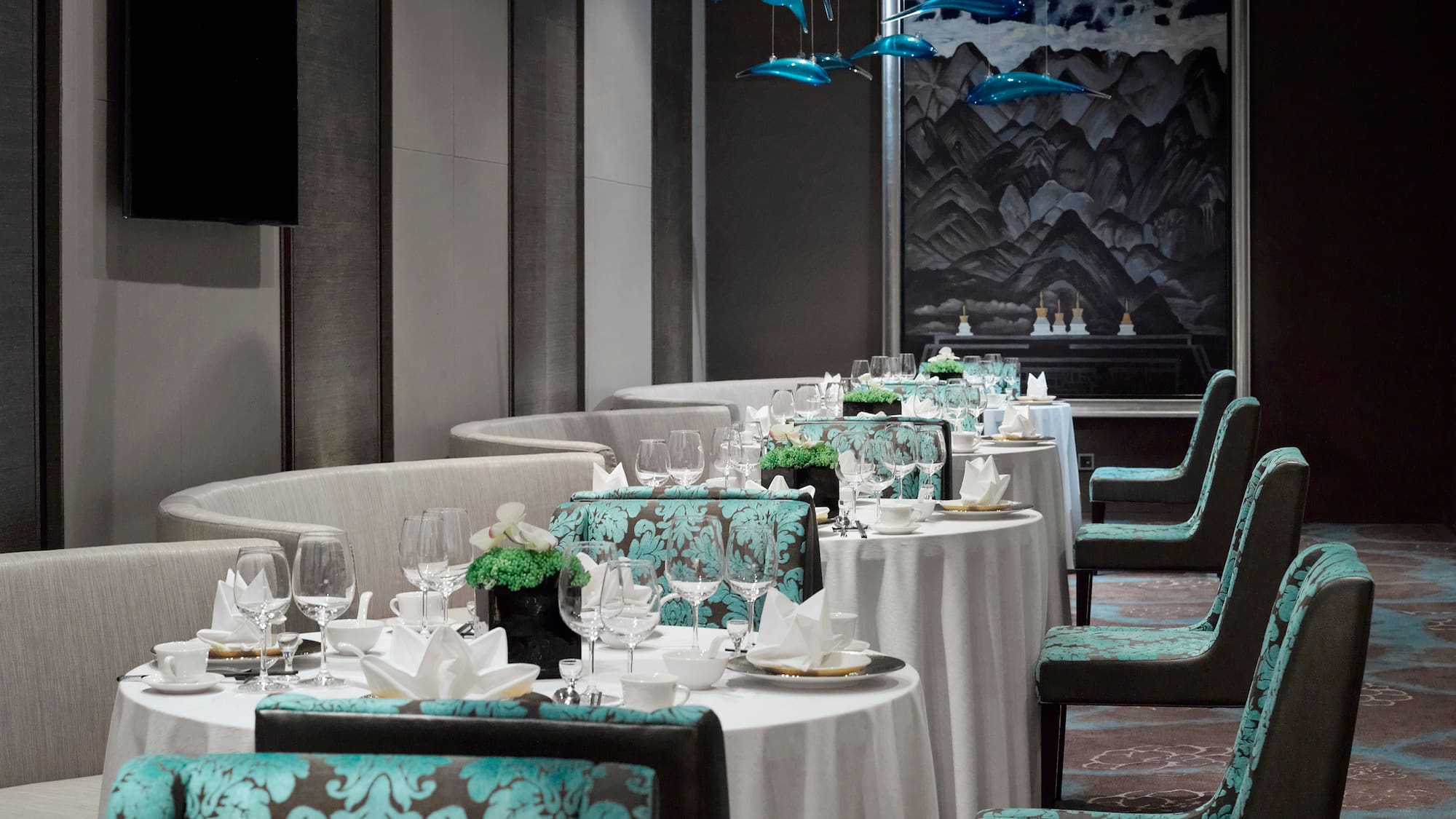 a restaurant with tables and chairs