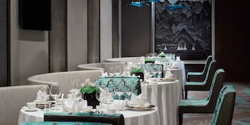 a restaurant with tables and chairs