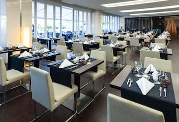 a room with tables and chairs