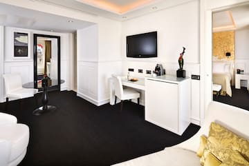 a room with a television and a table