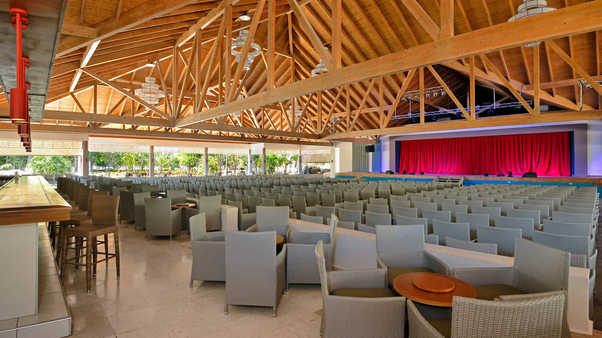 a room with chairs and tables