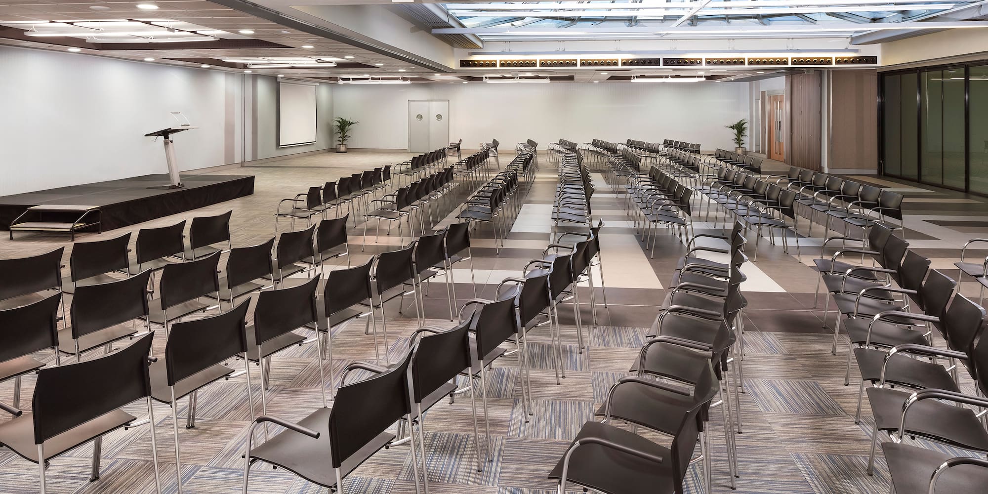 a room with rows of chairs