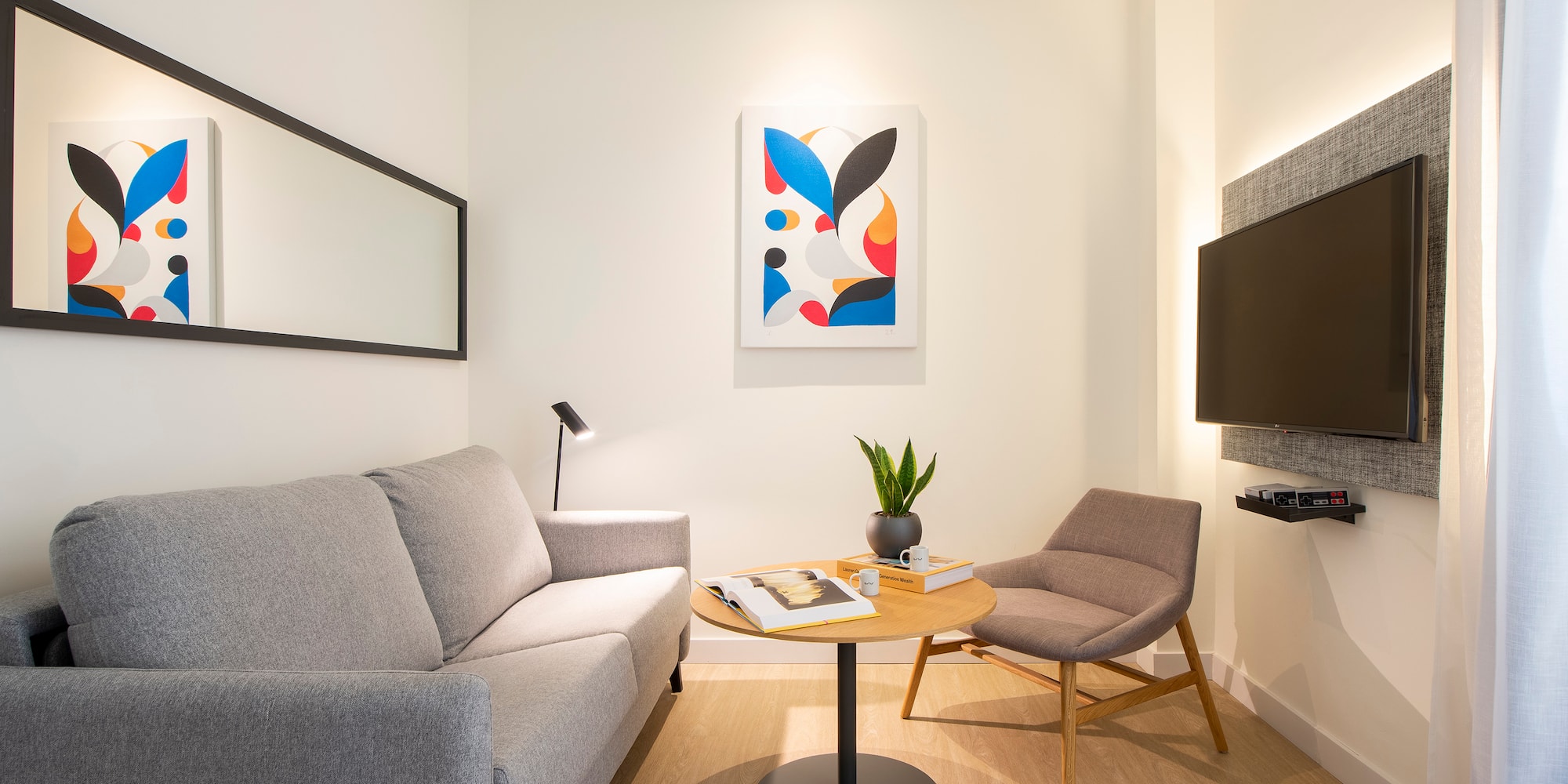 a living room with a couch and a table