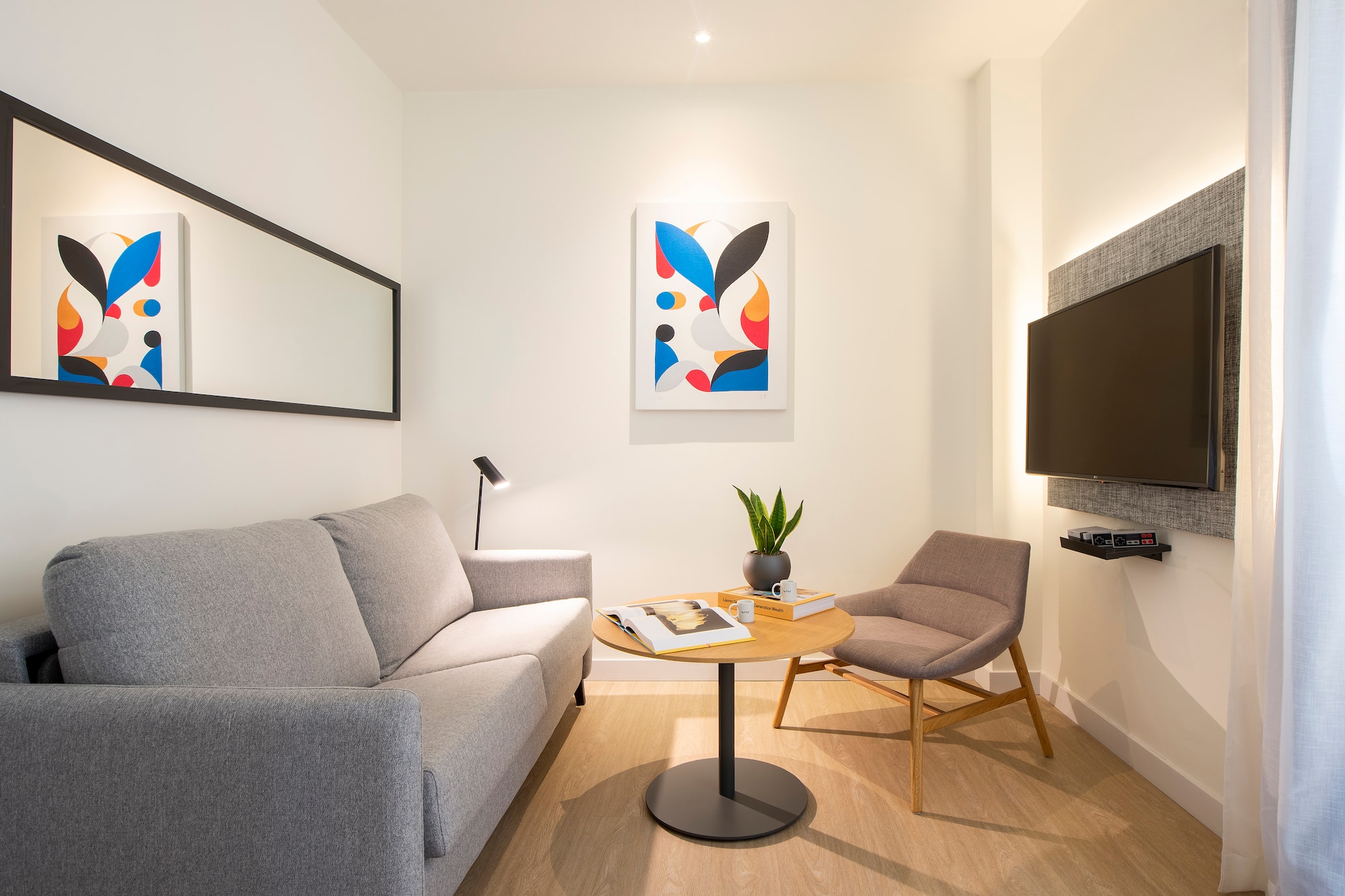 a living room with a couch and a table