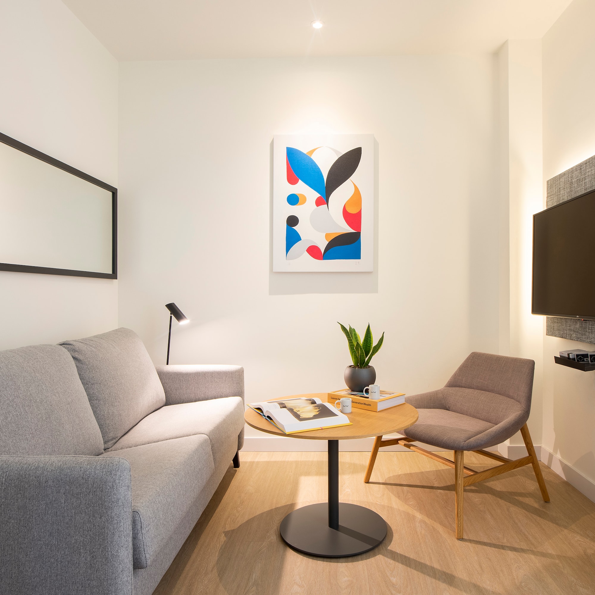 a living room with a couch and a table