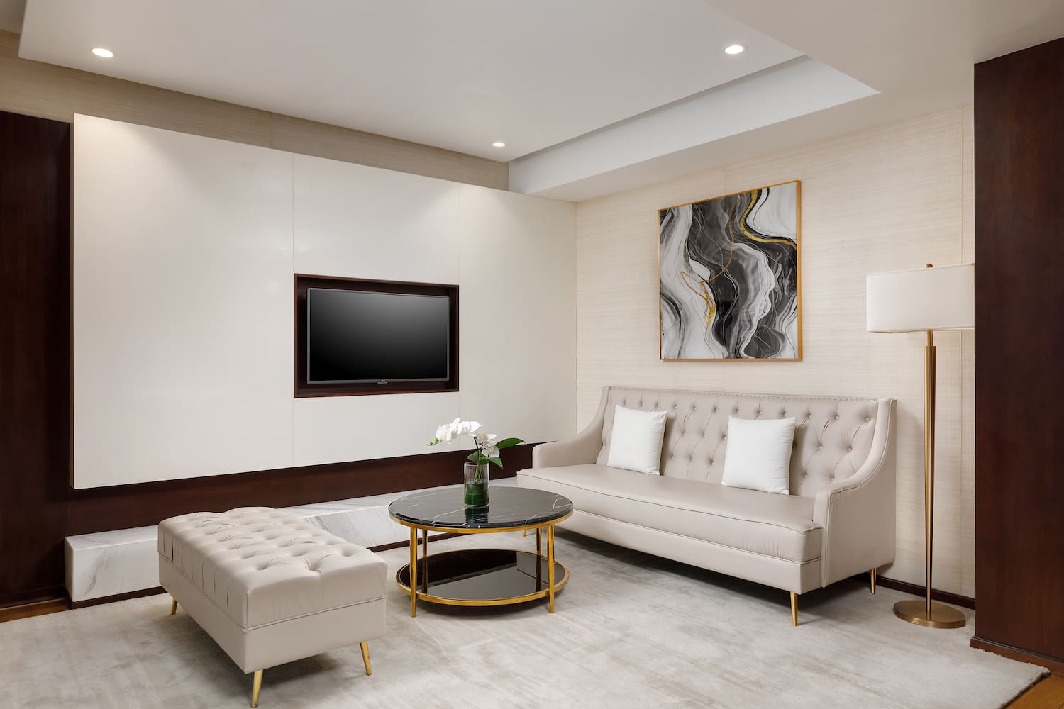 a living room with a couch and a tv