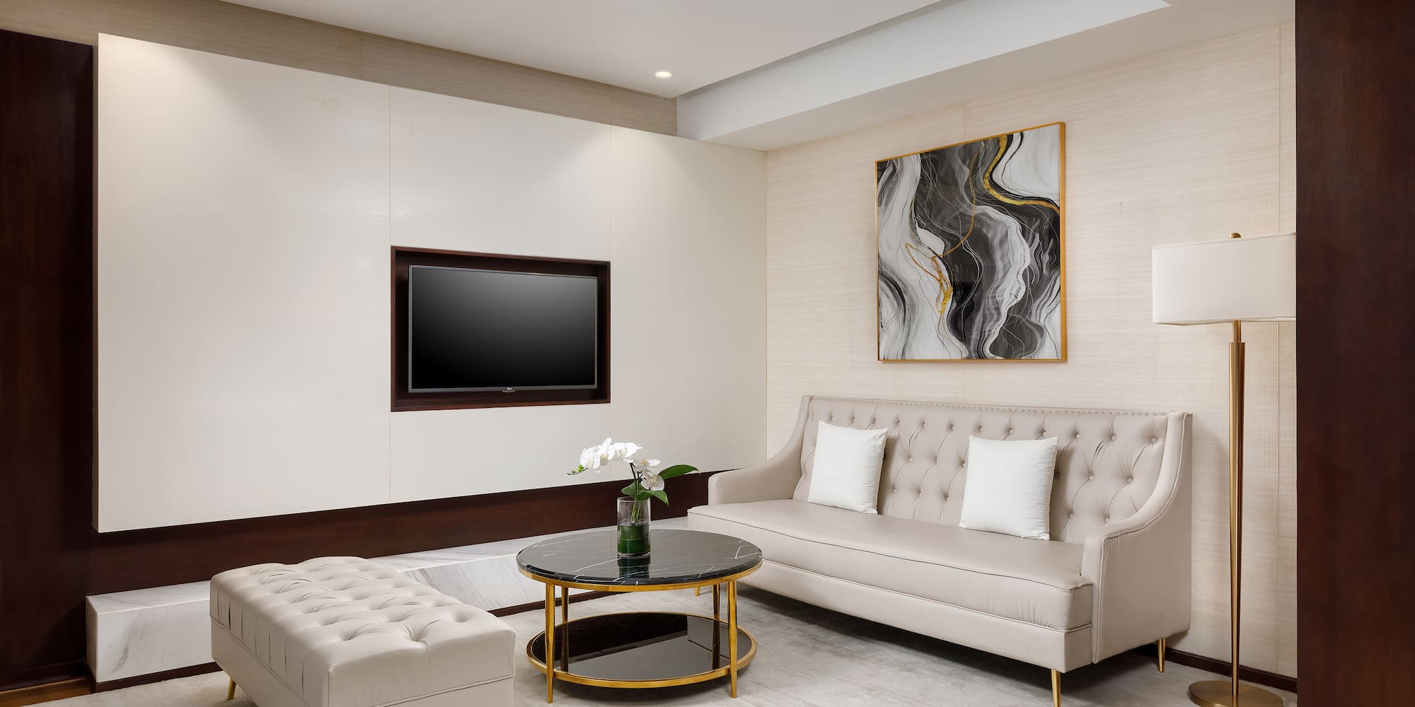 a living room with a couch and a tv