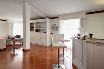 a room with a bar and a couch