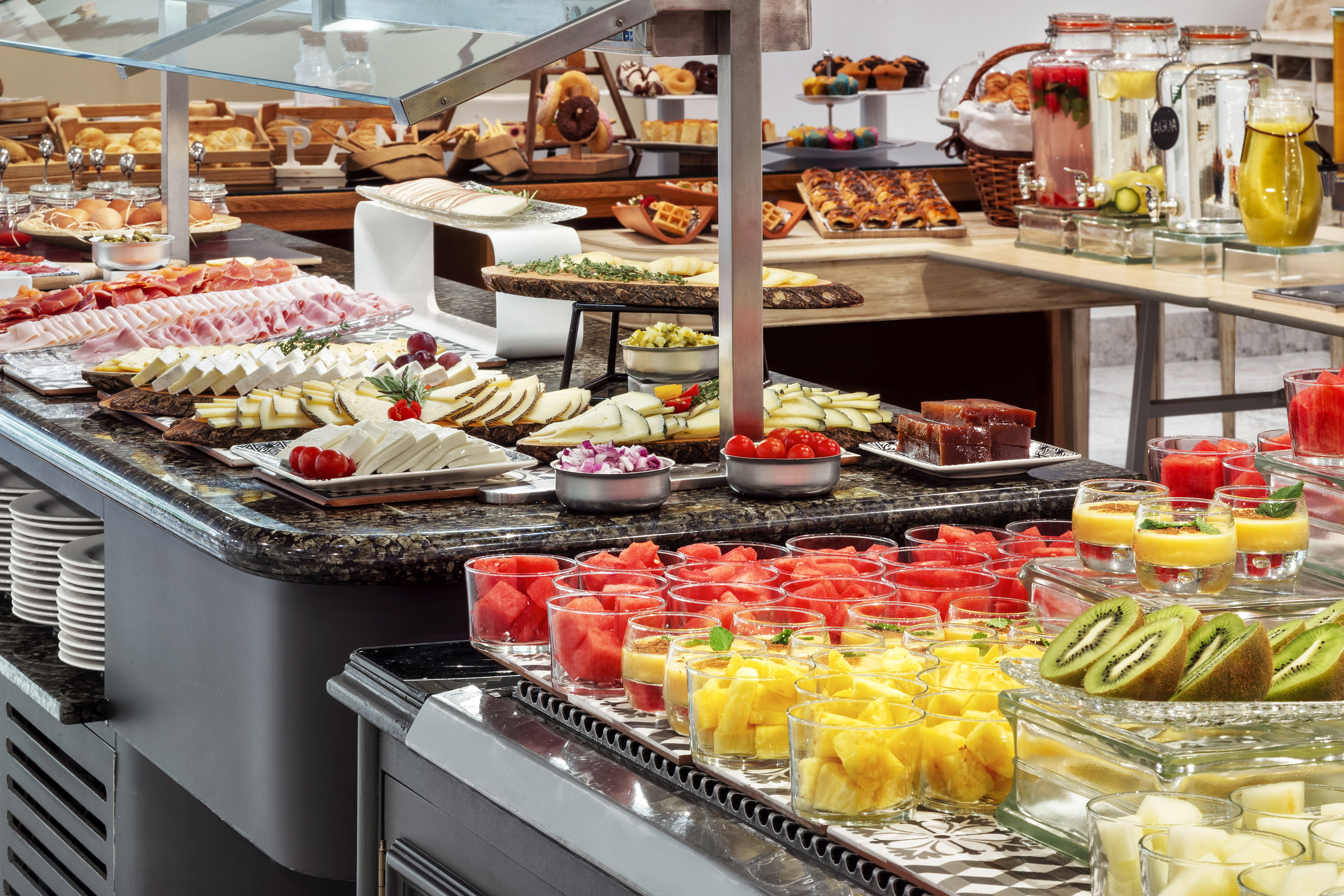 a buffet table with different food items