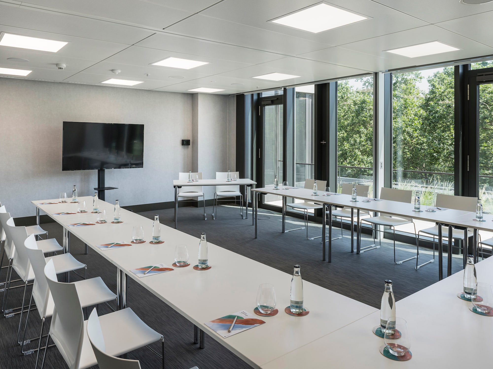 a room with tables and chairs