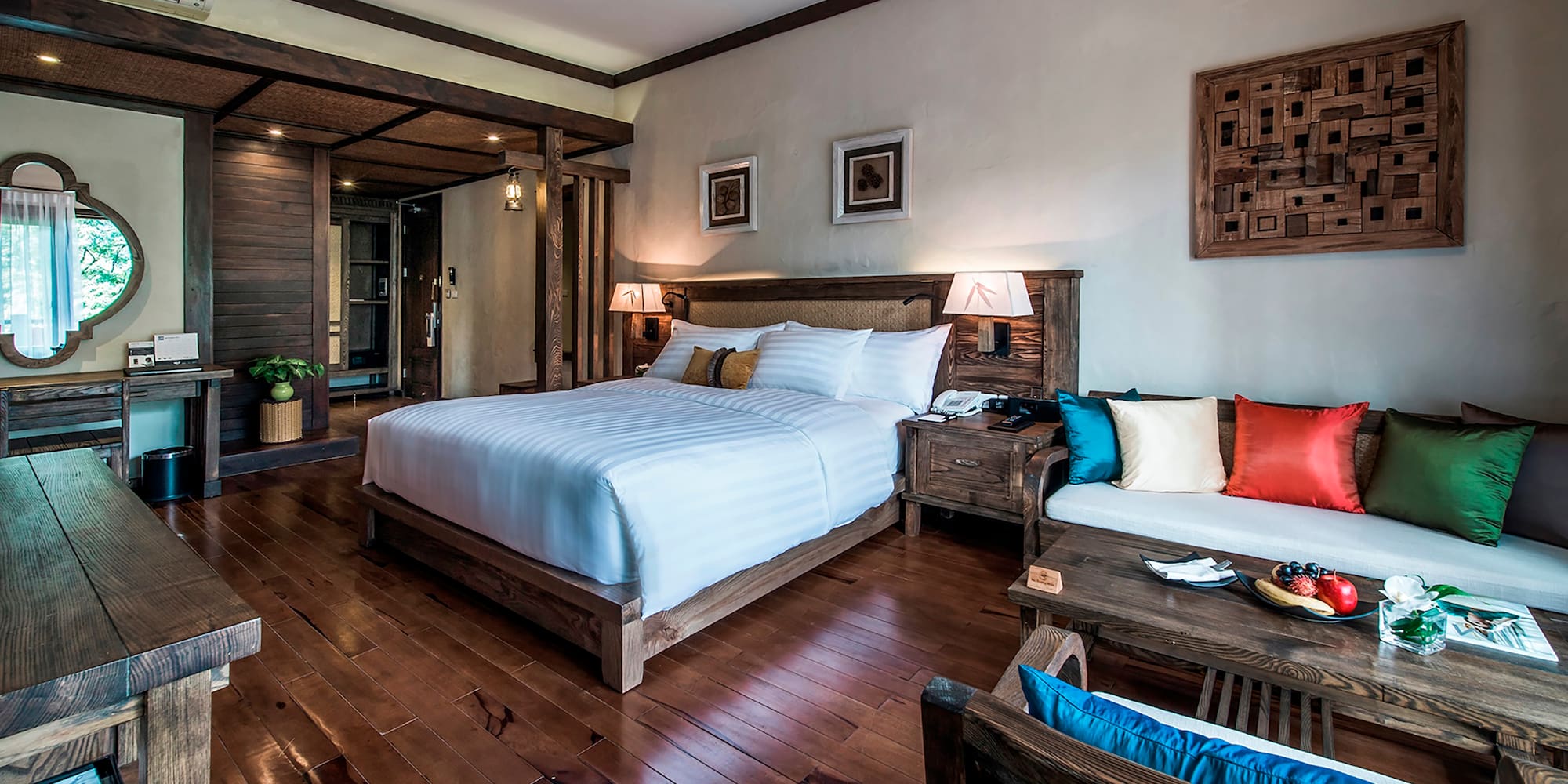 a bedroom with a bed and a table