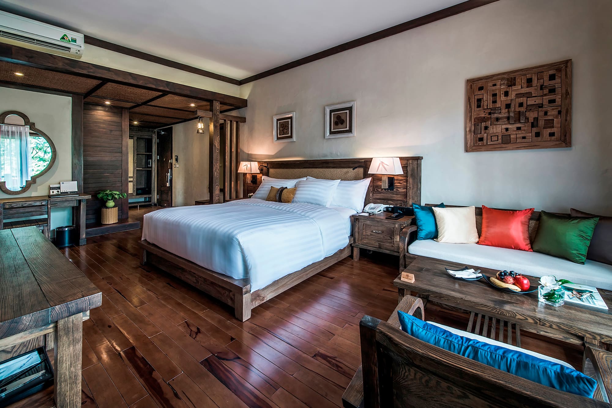 a bedroom with a bed and a table