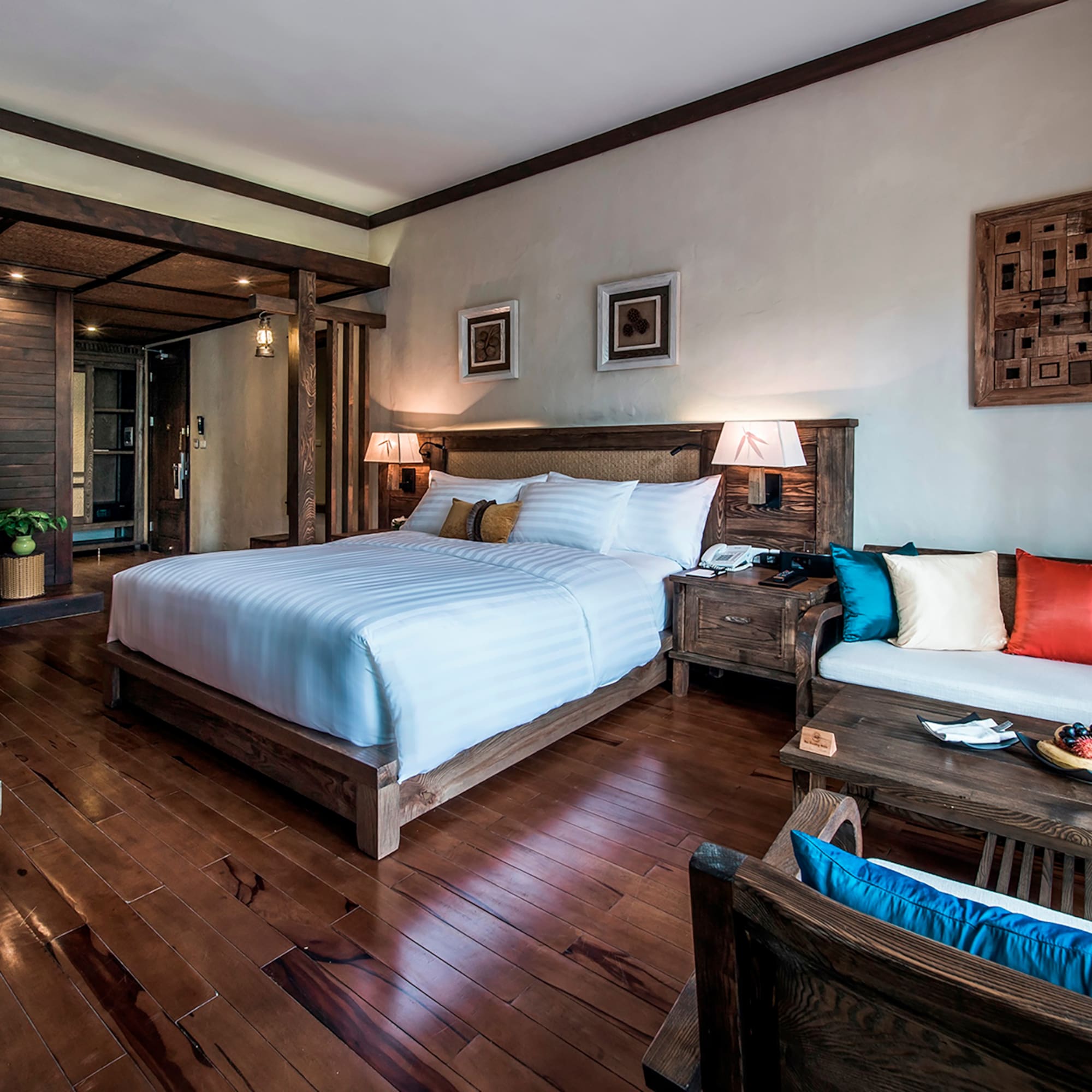 a bedroom with a bed and a table