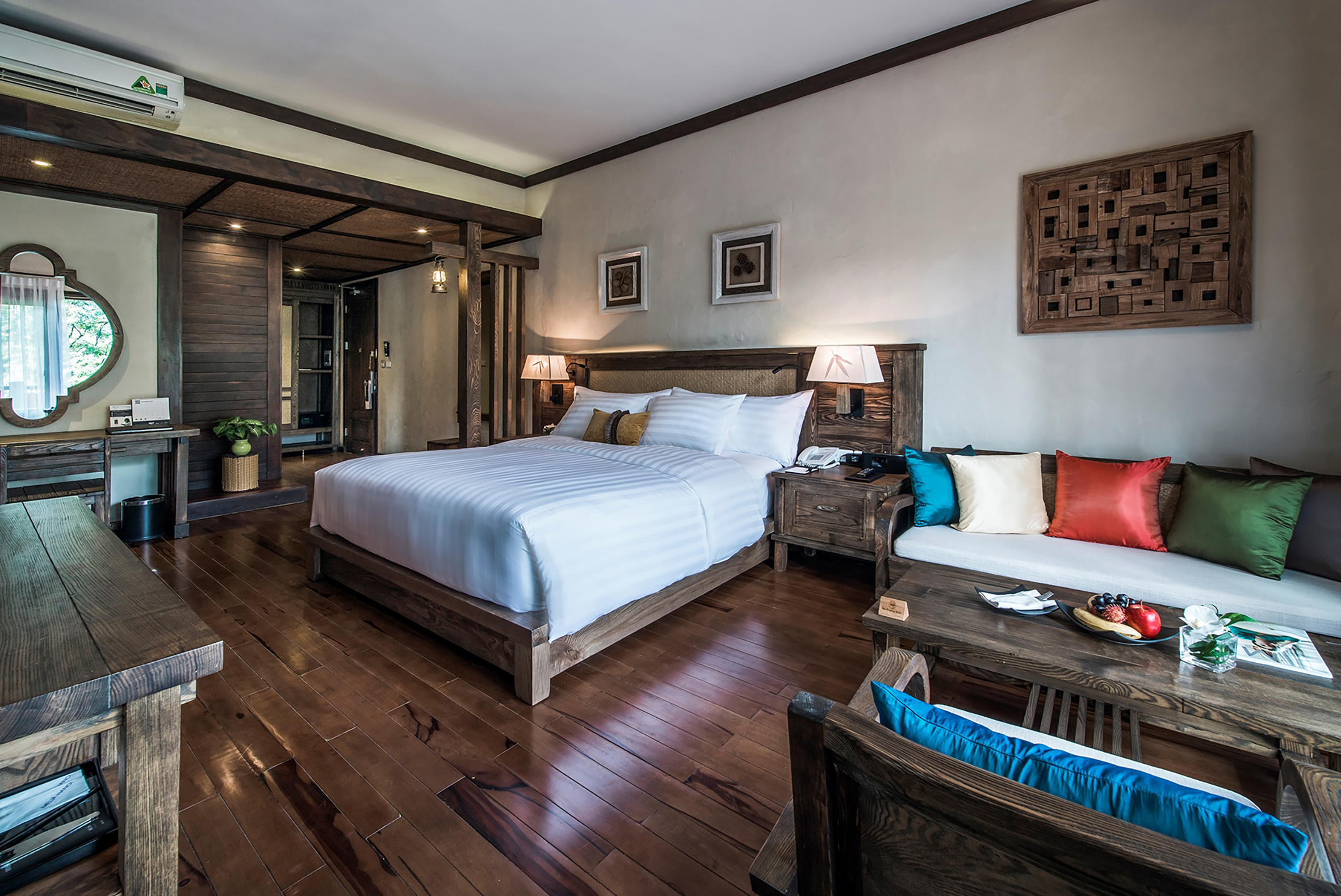 a bedroom with a bed and a table