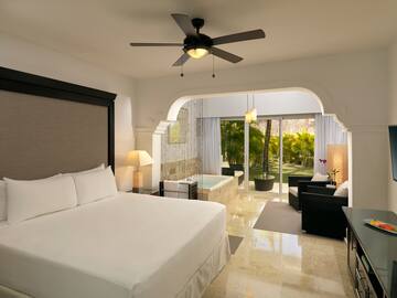 a room with a bed and a tub