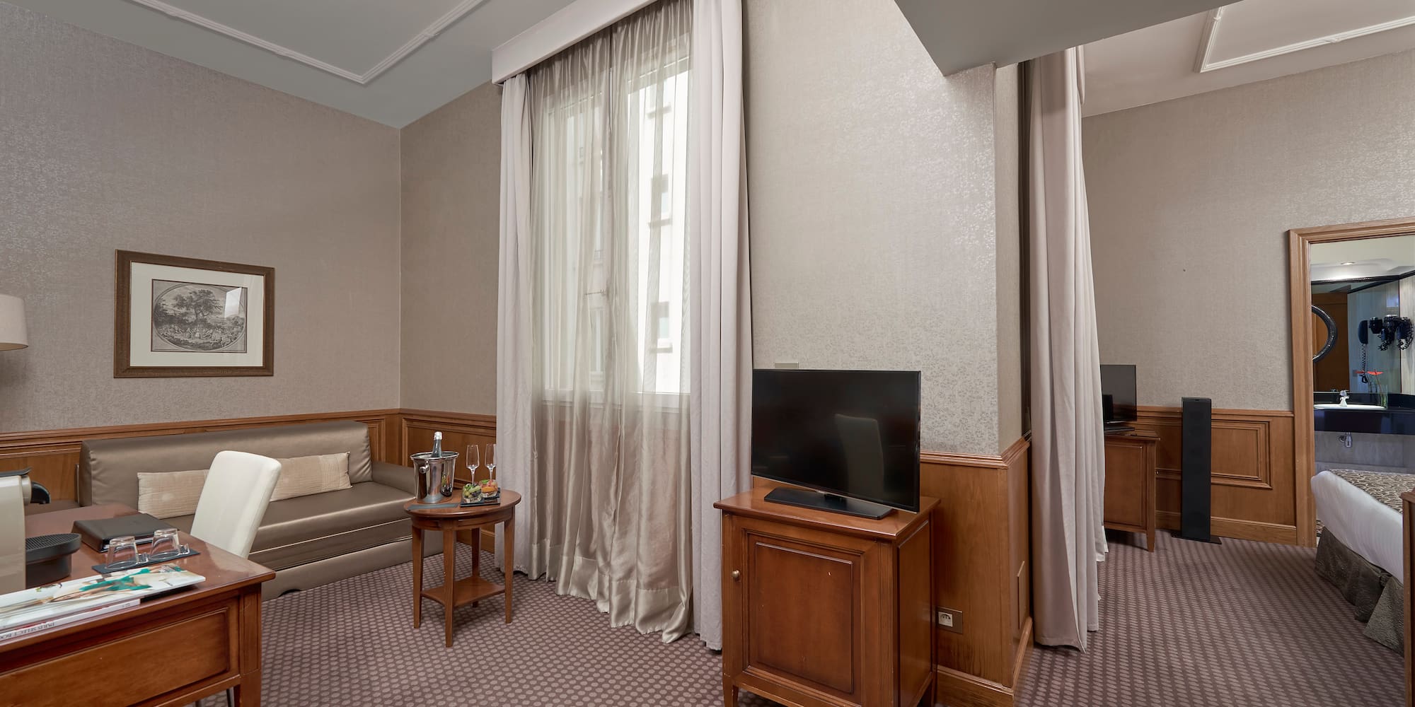 a room with a television and a couch