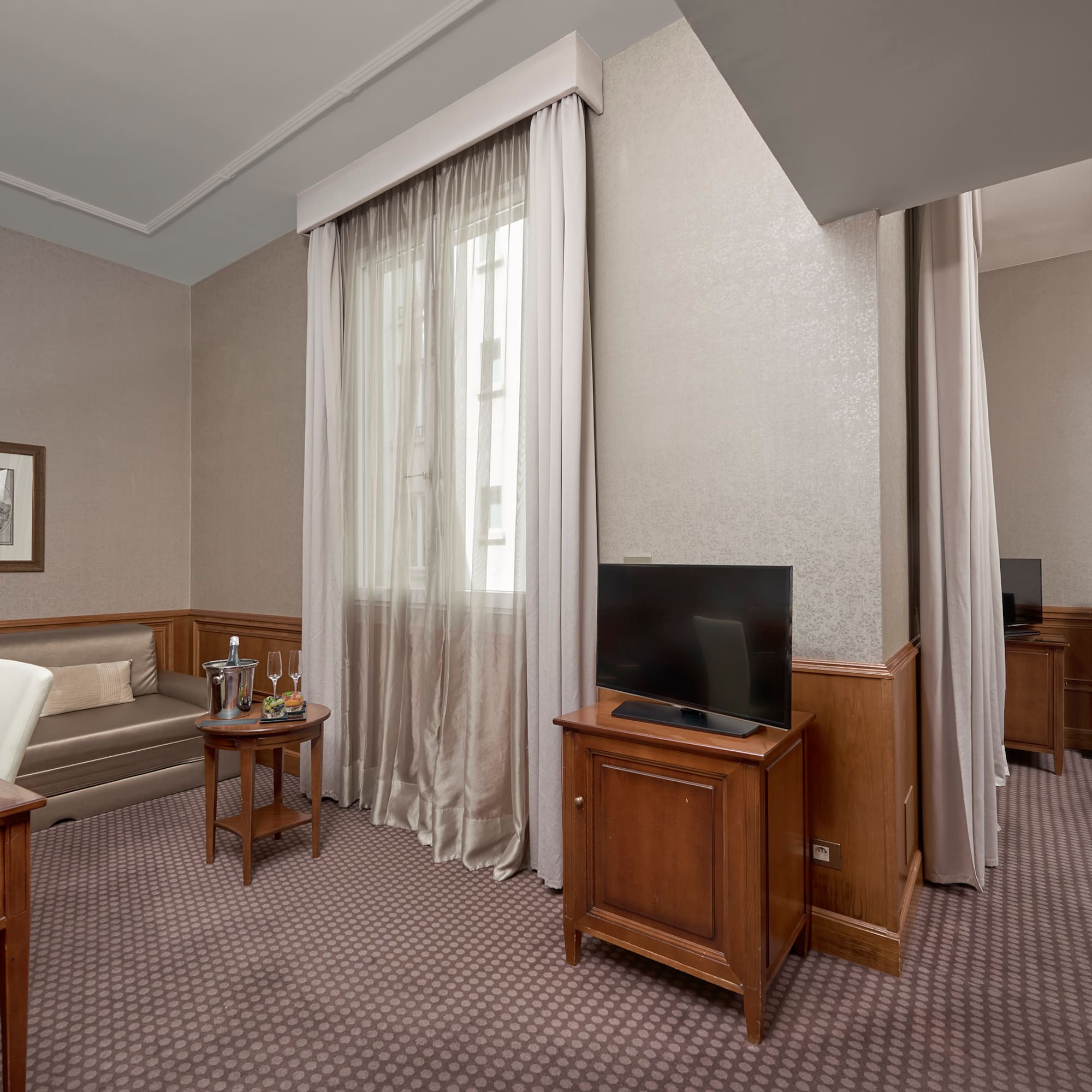 a room with a television and a couch