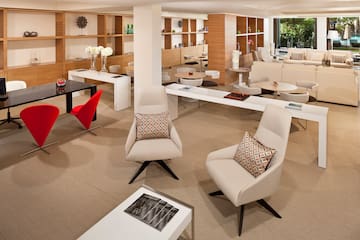 a room with chairs and tables