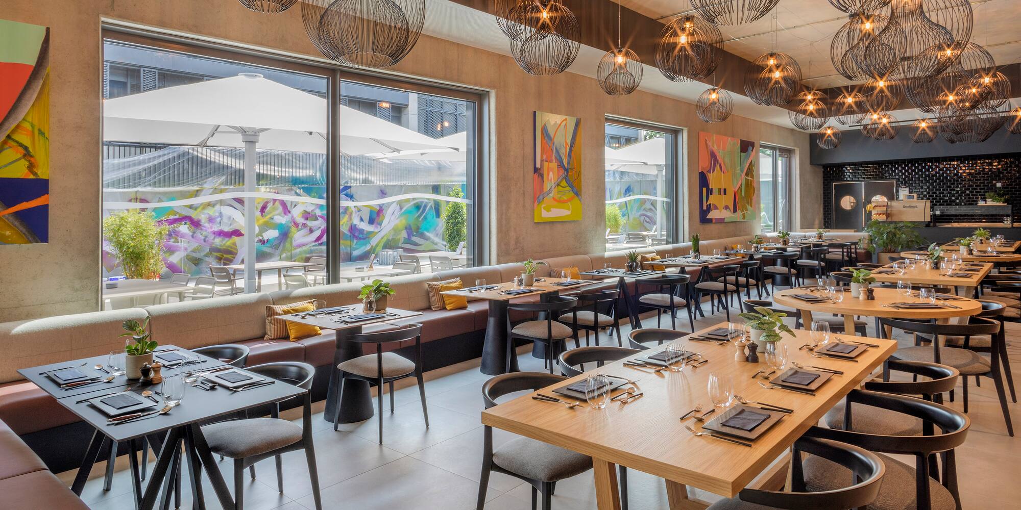 a restaurant with tables and chairs