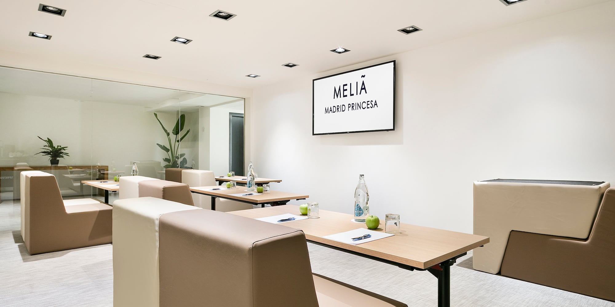 a room with tables and chairs