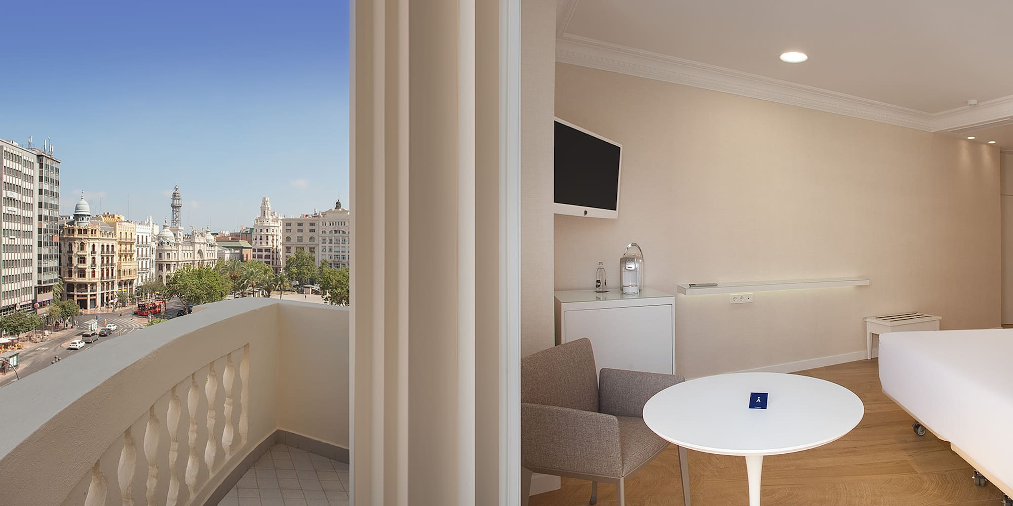 a room with a table and chairs