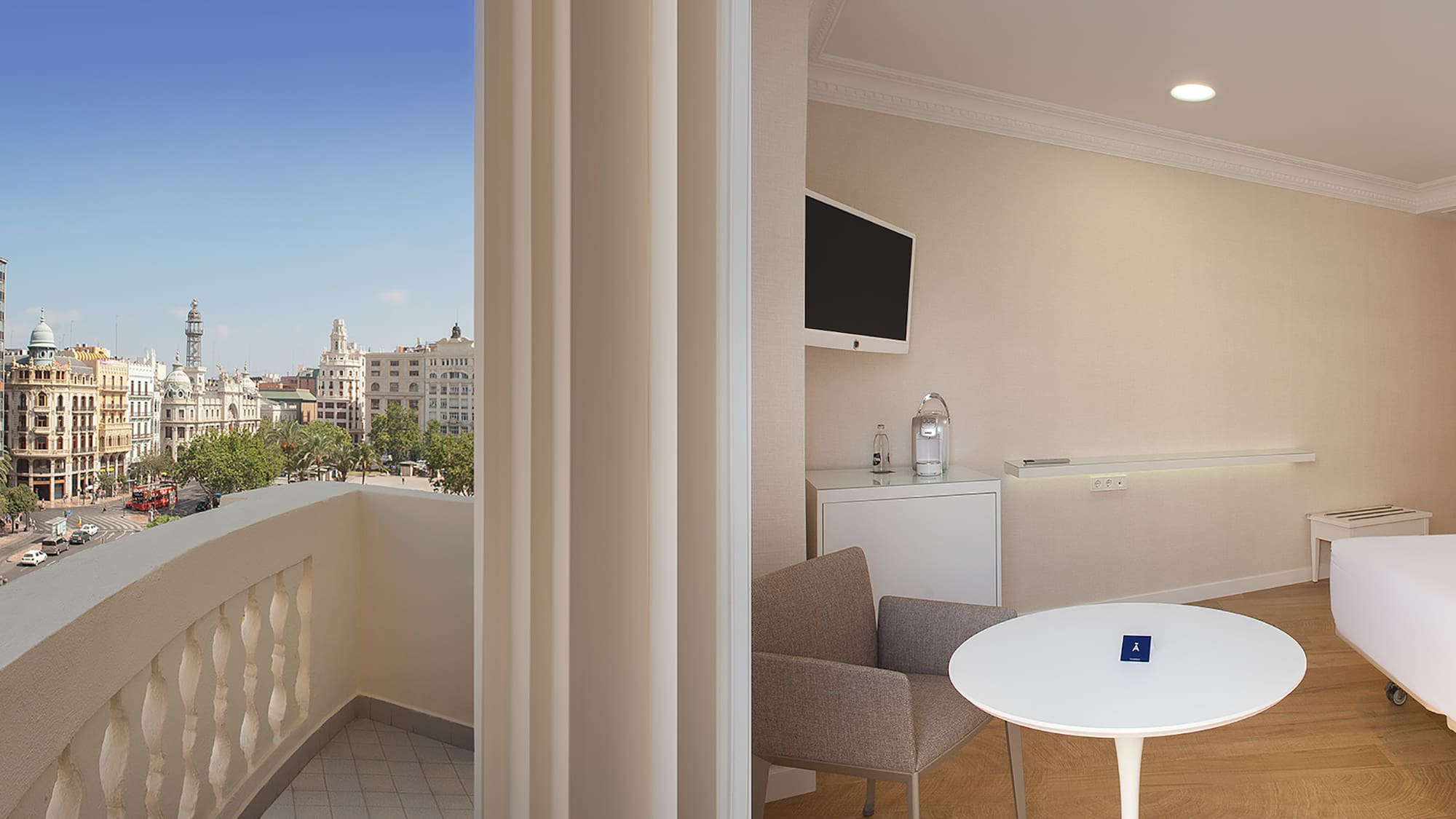 a room with a table and chairs