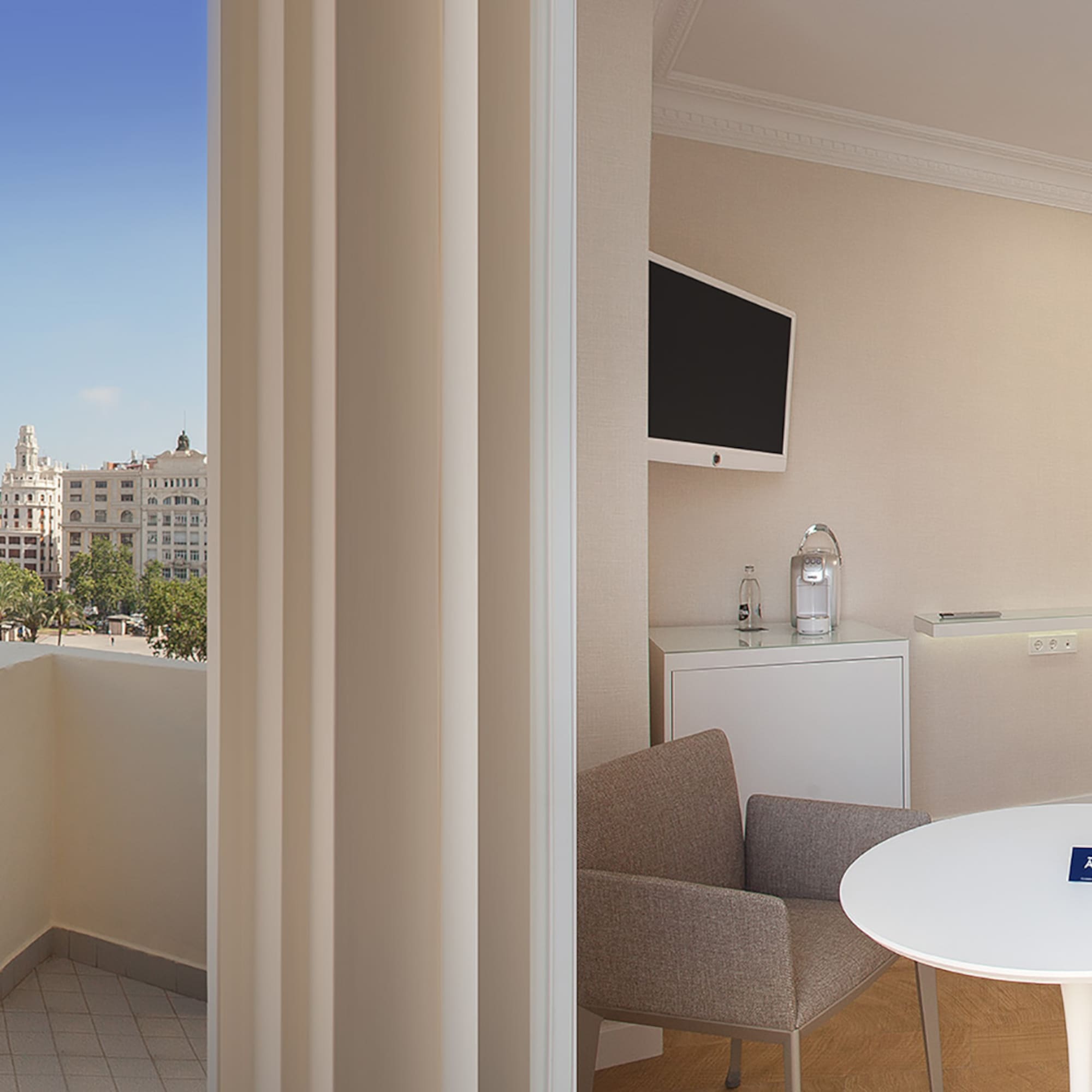 a room with a table and chairs