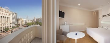 a room with a table and chairs