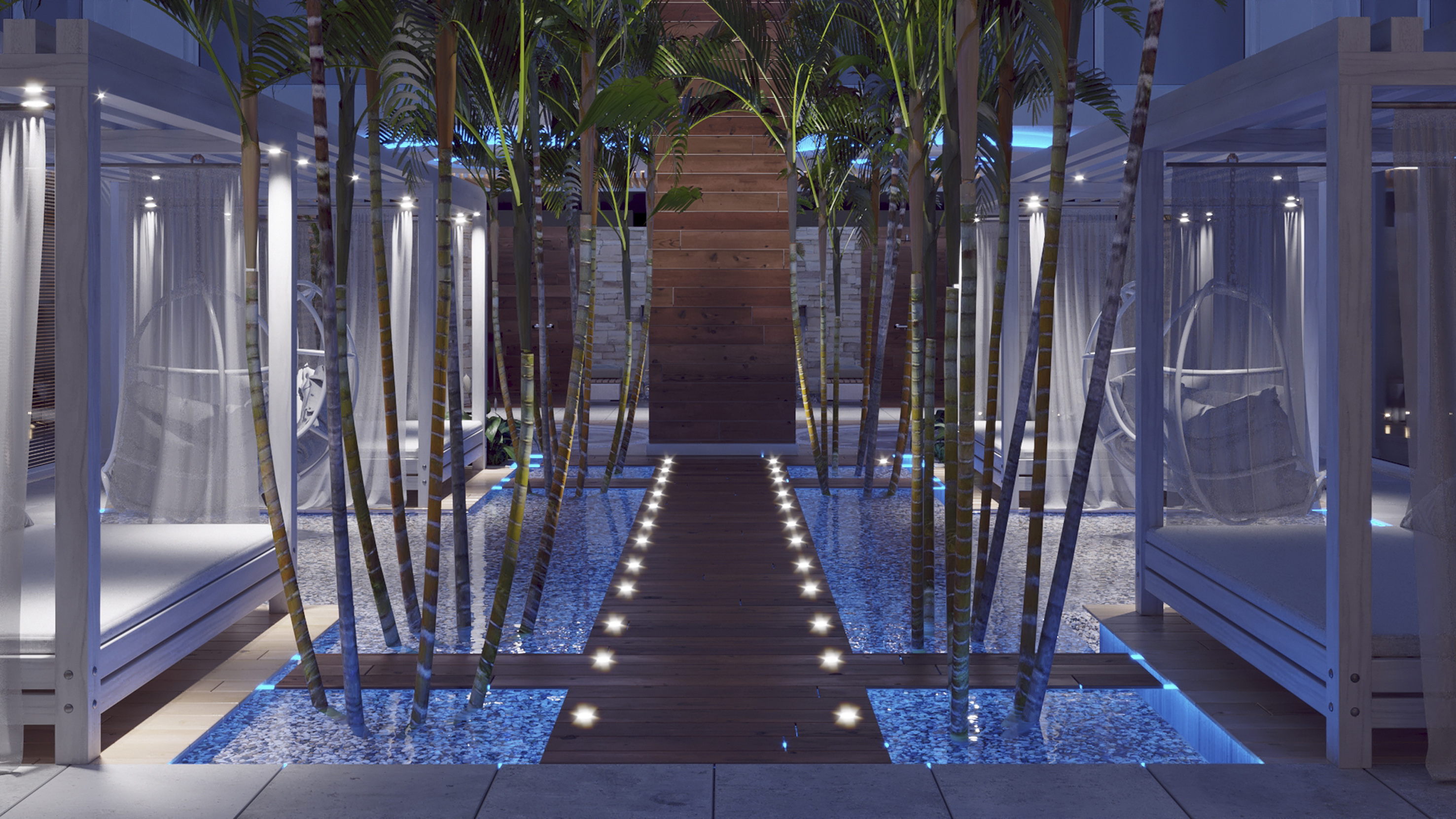 a walkway with trees in the water