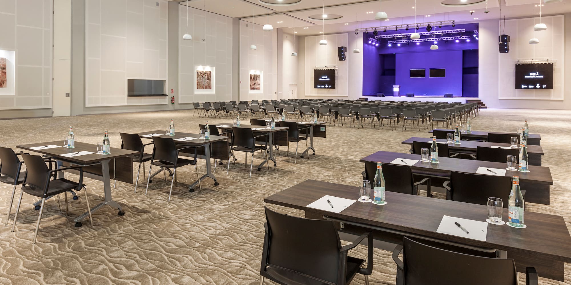 a room with tables and chairs