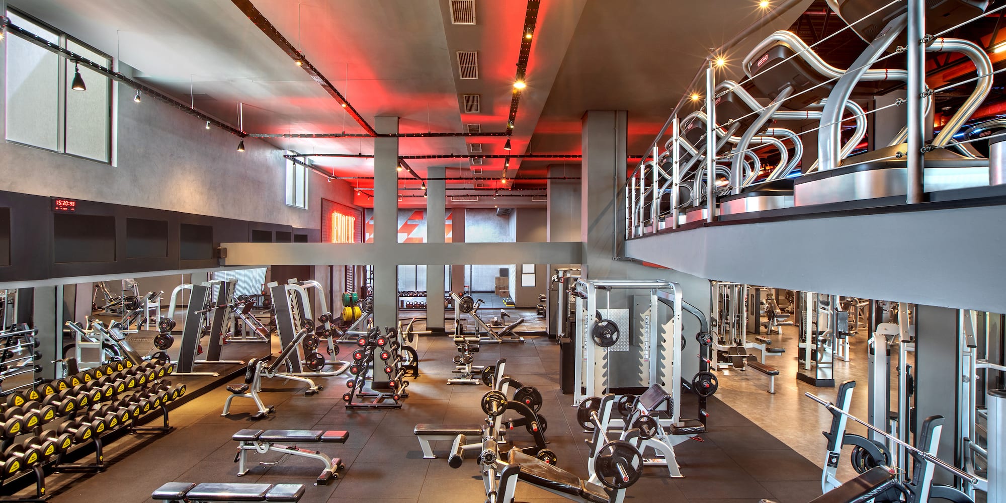 a large gym with exercise equipment