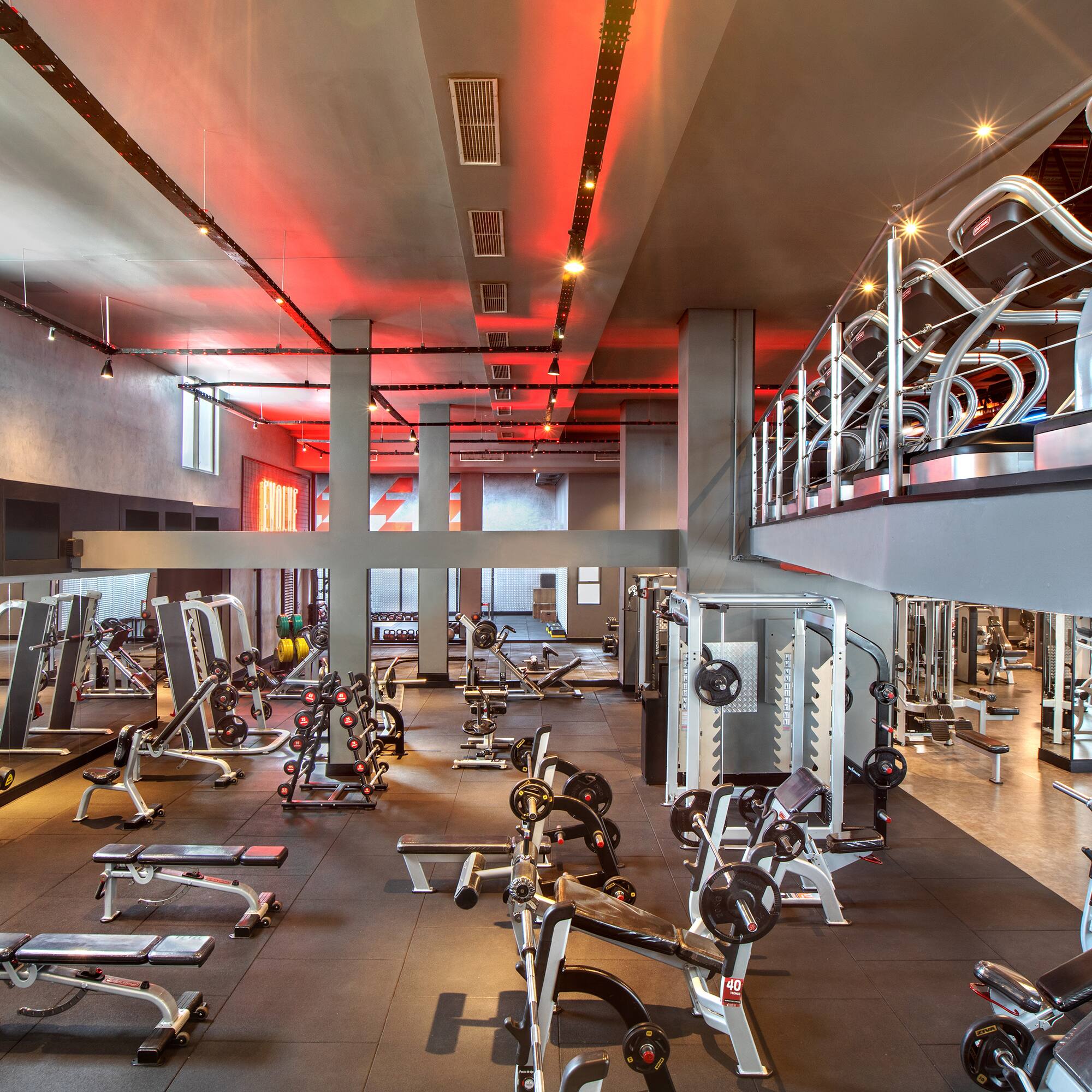 a large gym with exercise equipment