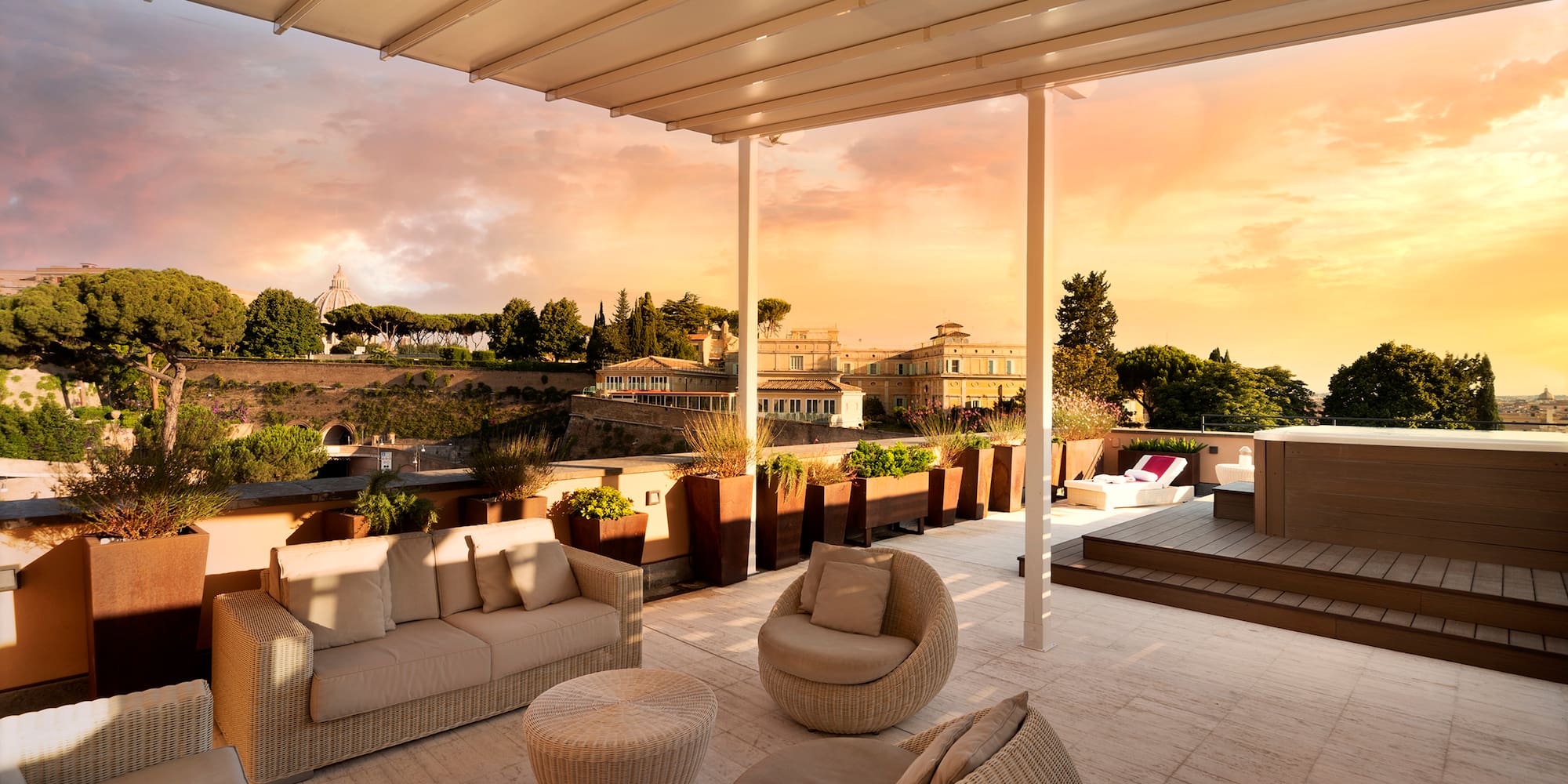 a patio with a covered patio and a view of a city